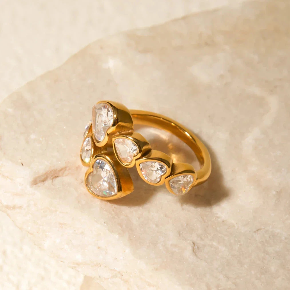 Elegant 18K gold-plated ring with a sparkling cubic zirconia heart-shaped centerpiece