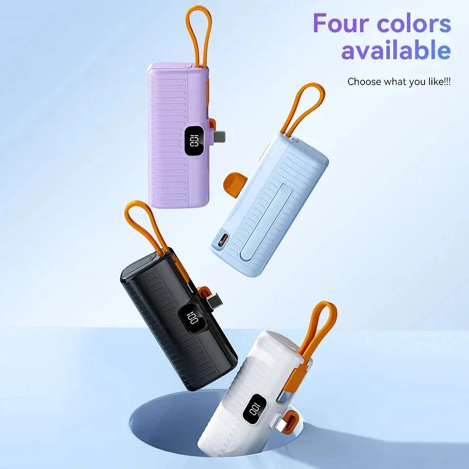 A compact, dual-port 30,000mAh power bank with built-in charging cables and fast charging capabilities.