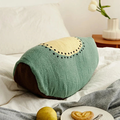 A colorful, fruit-themed accent pillow with a cozy, plush design for comfortable home decor