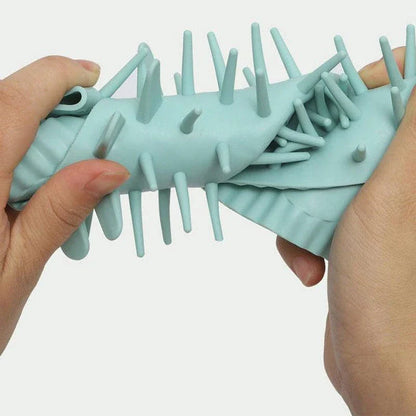 Silicone pet paw cleaner with soft bristles for gentle scrubbing and ergonomic design for easy handling