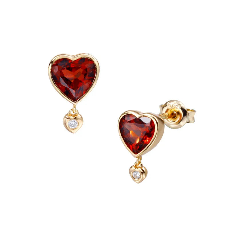 Elegant heart-shaped earrings with natural garnet and zircon stones in a pomegranate color, showcasing a timeless, versatile design.