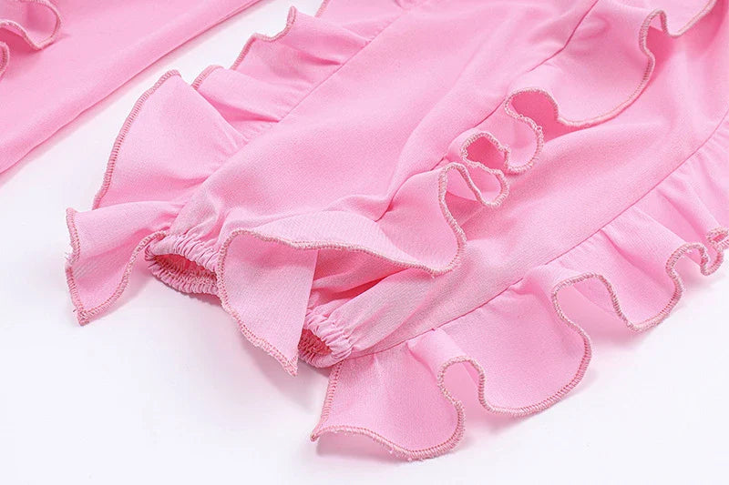 Cute heart-shaped bow tie blouse for girls in pink with ruffled v-neck and slim fit