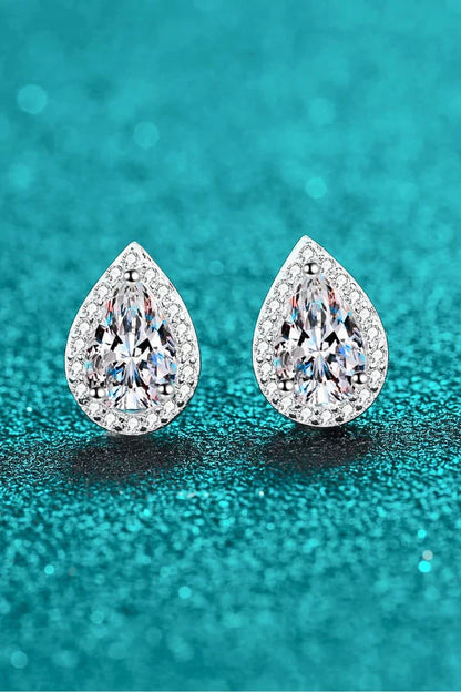 Captivating 925 sterling silver moissanite teardrop stud earrings with a polished rhodium-plated finish and zircon accent stones