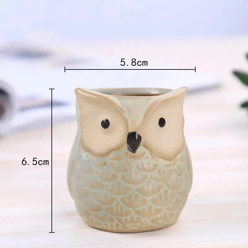 Adorable mini owl-shaped ceramic planter for small plants and succulents, featuring vibrant colors and vintage charm