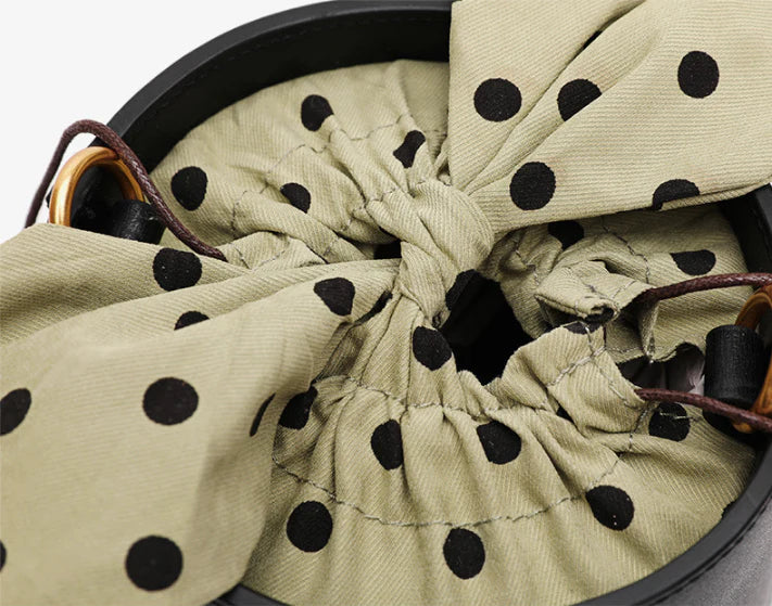 Premium leather bucket bag tote with bow-type closure, exquisite golden hardware, and versatile design