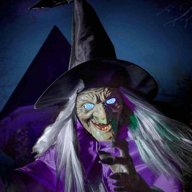 Floating Halloween witch decoration with broom, lifelike facial features, and flowing purple skirt for spooky outdoor display