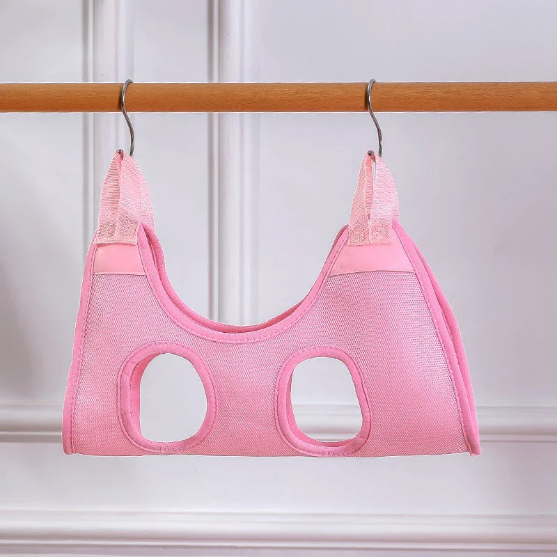 A green cat grooming hammock with a breathable and comfortable design for easy nail trimming, bathing, and grooming.