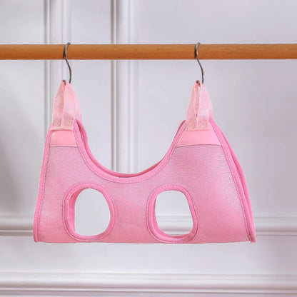 A green cat grooming hammock with a breathable and comfortable design for easy nail trimming, bathing, and grooming.