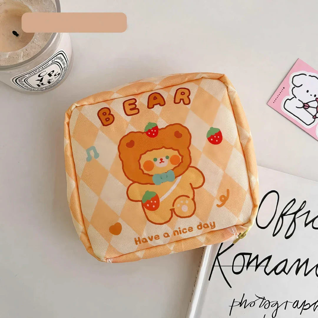 Adorable cartoon nylon cosmetic bag with secure zipper closure and compact, box-shaped design