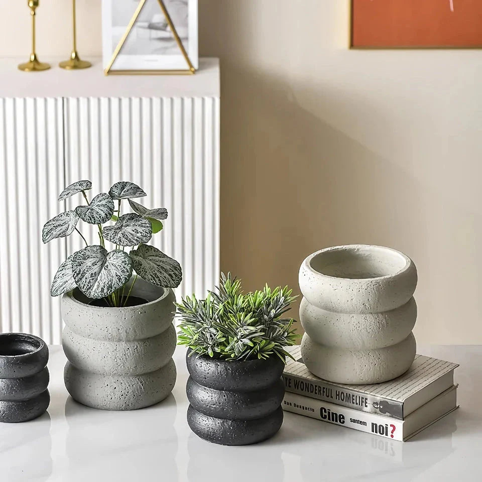 Modern minimalist cement flower pot with Nordic-inspired design, available in small and medium sizes for indoor and outdoor use