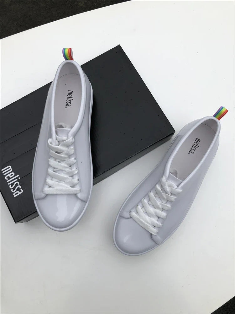 Premium lace-up sneakers for women with stylish flat design in black color