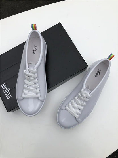 Premium lace-up sneakers for women with stylish flat design in black color