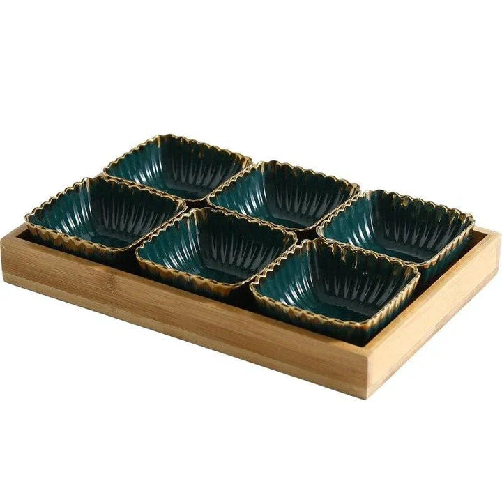 Elegant green and gold ceramic serving platter with a wood trim, perfect for hosting and elevating your dining experience.