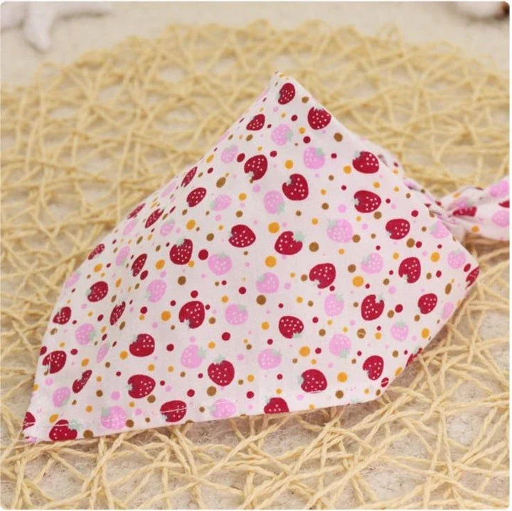 Adorable Cartoon Patterned Triangular Dog Scarf in vibrant colors, perfect for keeping your pup warm and stylish
