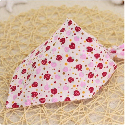 Adorable Cartoon Patterned Triangular Dog Scarf in vibrant colors, perfect for keeping your pup warm and stylish