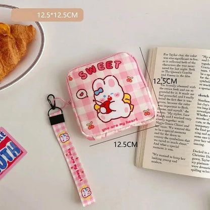 Adorable cartoon nylon cosmetic bag with secure zipper closure and compact, box-shaped design