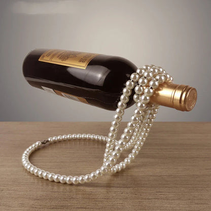 Elegant white iron wine rack with pearl necklace-inspired design, displayed on a desktop or shelf