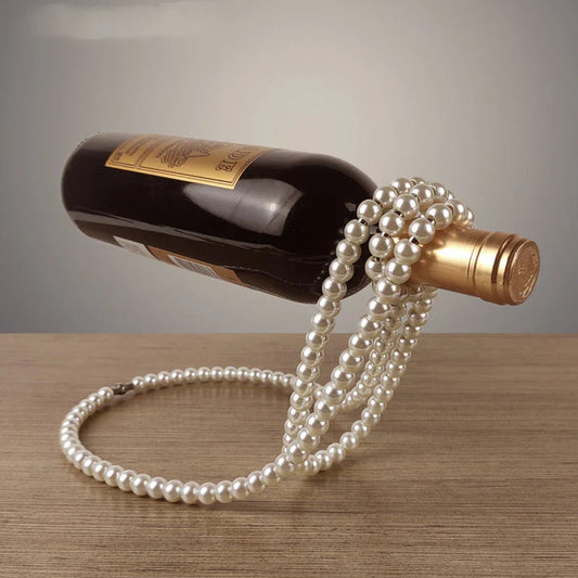 Elegant white iron wine rack with pearl necklace-inspired design, displayed on a desktop or shelf