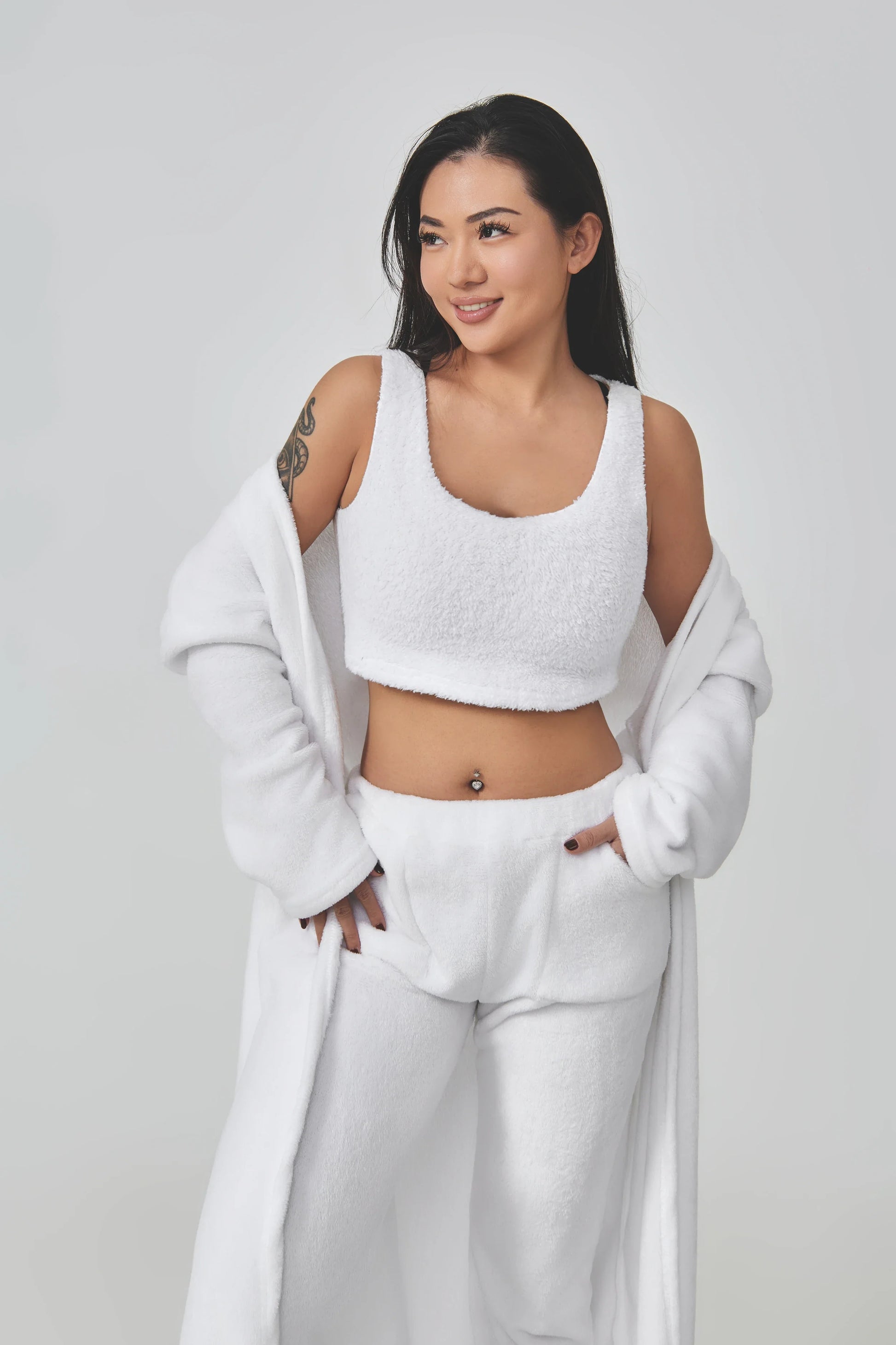 Cozy 3-piece loungewear set in pastel colors including crop top, wide-leg pants, and matching cardigan