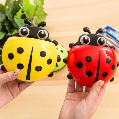 Colorful ladybug-shaped toothbrush holder with suction cup for easy wall mounting and organized storage