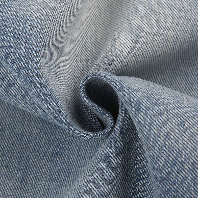 Premium embroidered high-rise straight leg denim jeans in a classic blue color