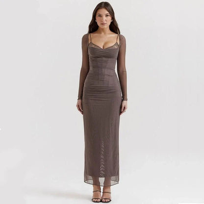 Elegant sheer long sleeve maxi dress with a backless design and H-profile silhouette for a sophisticated and alluring evening look.