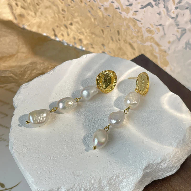 Elegant gold coin long earrings with a luxurious, statement-making design
