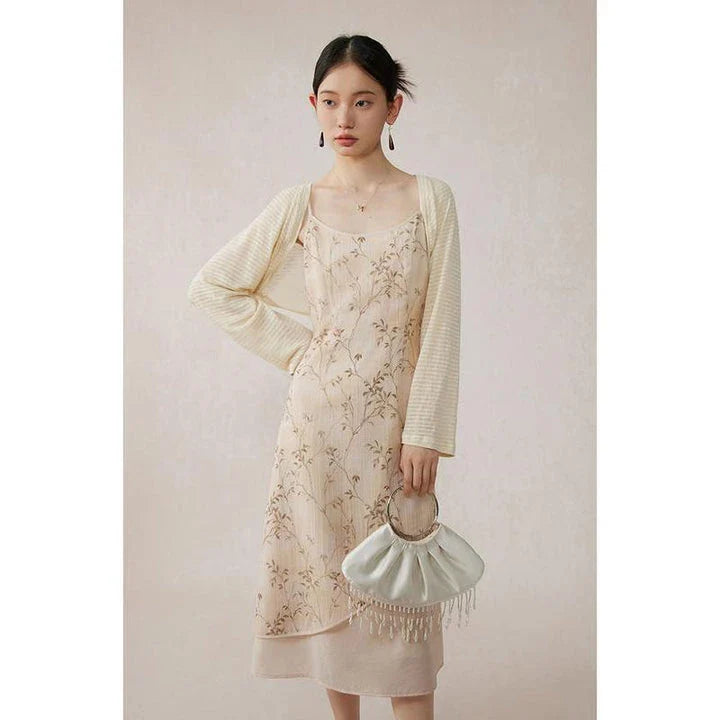 Elegant floral A-line midi dress with spaghetti straps and lace accents