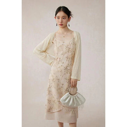 Elegant floral A-line midi dress with spaghetti straps and lace accents