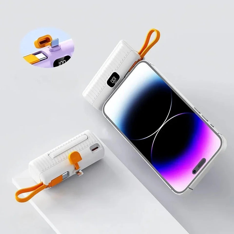 A compact, dual-port 30,000mAh power bank with built-in charging cables and fast charging capabilities.