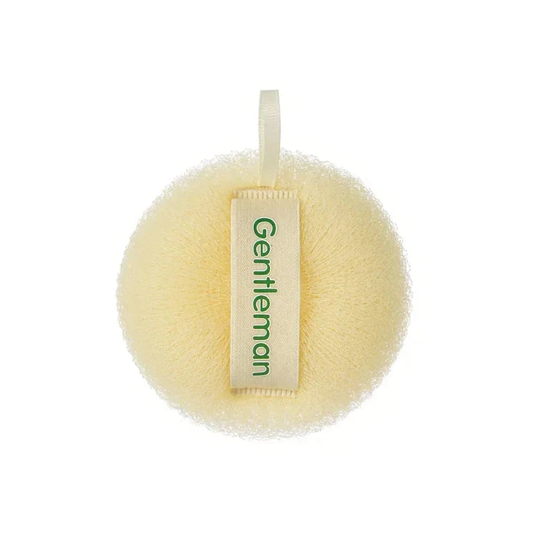 Exfoliating bath sponge balls in a yellow color, designed to provide a luxurious, spa-like shower experience with gentle exfoliation and a relaxing massage.