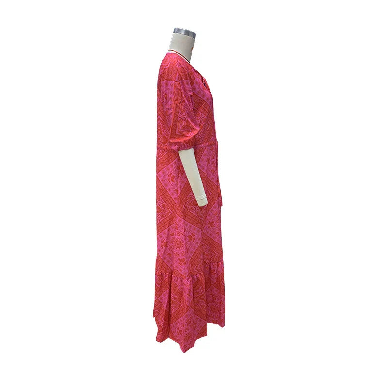 A vibrant red Bohemian-style dress with a geometric print pattern, featuring a mid-length, flattering silhouette and stretchy, comfortable Spandex fabric