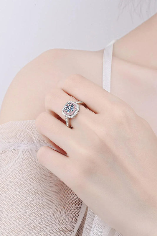 A stunning moissanite ring with a captivating center stone and a hand-polished 925 sterling silver setting, perfect for everyday elegance.