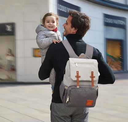 Premium diaper backpack with insulated pockets, stroller attachment, and USB charging port