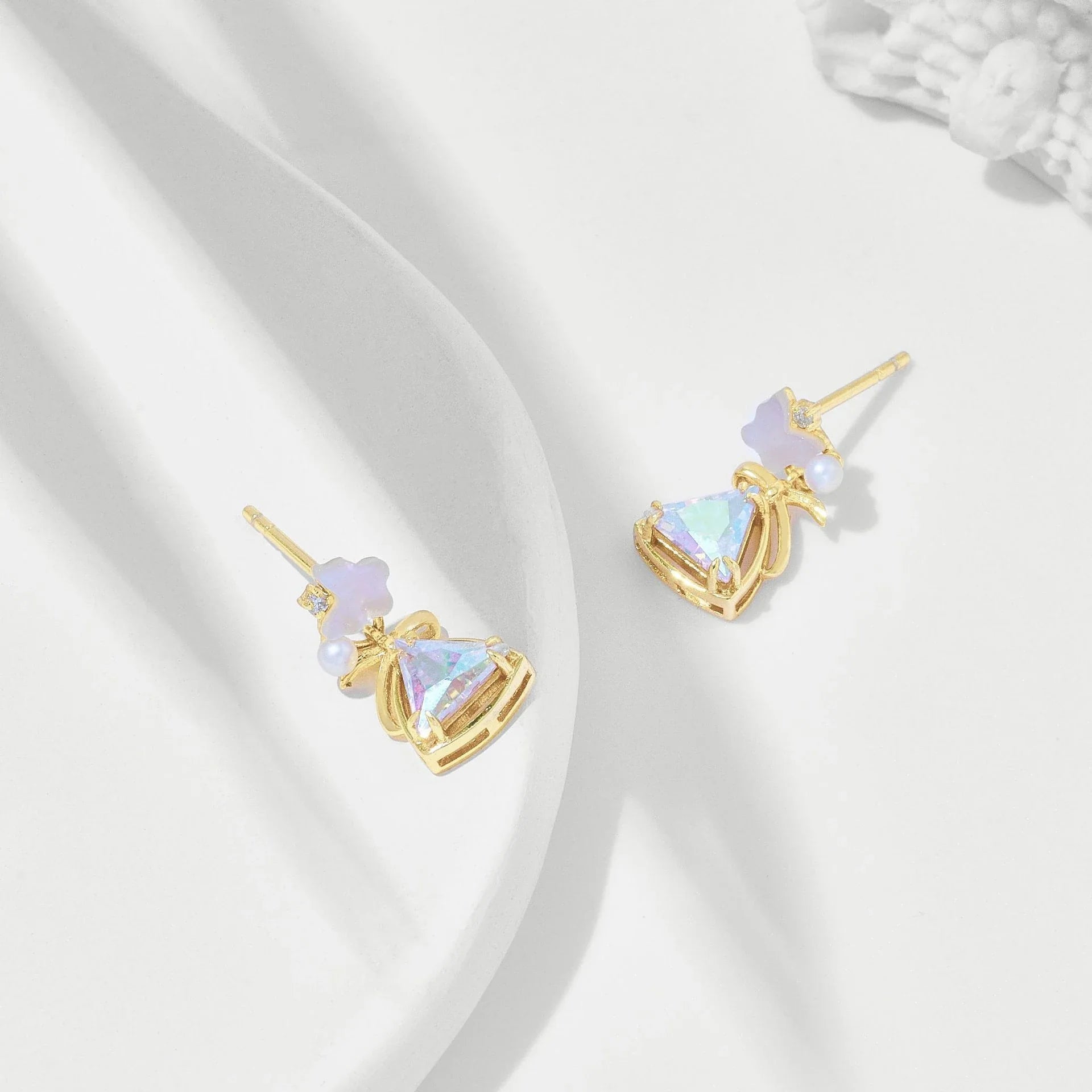 White Shellfish Butterfly Earrings - Elegant sterling silver earrings with natural seashell accents and a captivating geometric butterfly design