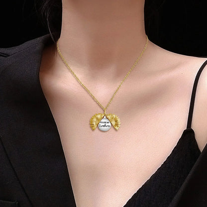 Elegant sunflower necklace with a captivating flower-shaped pendant in gold, silver, or rose gold finish