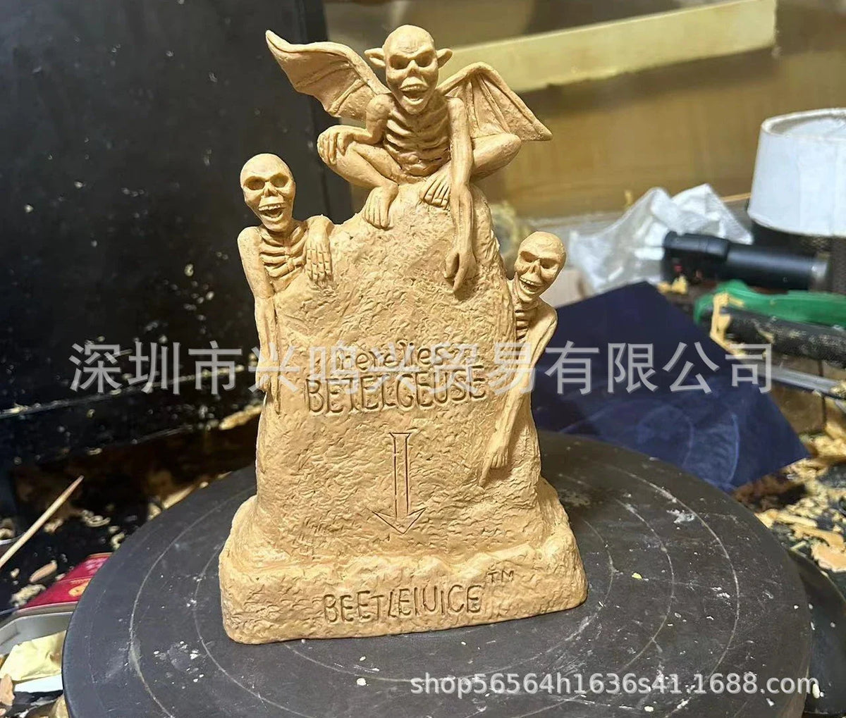 Glowing ghost skull tombstone decor with a spooky, otherworldly glow for Halloween