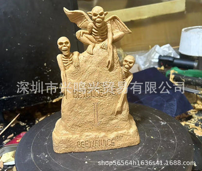 Glowing ghost skull tombstone decor with a spooky, otherworldly glow for Halloween