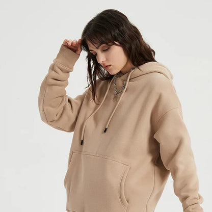 Cozy Fleece Hoodie and Sweatpants Set in Light Pink, featuring a relaxed fit and hooded design for maximum comfort and style.