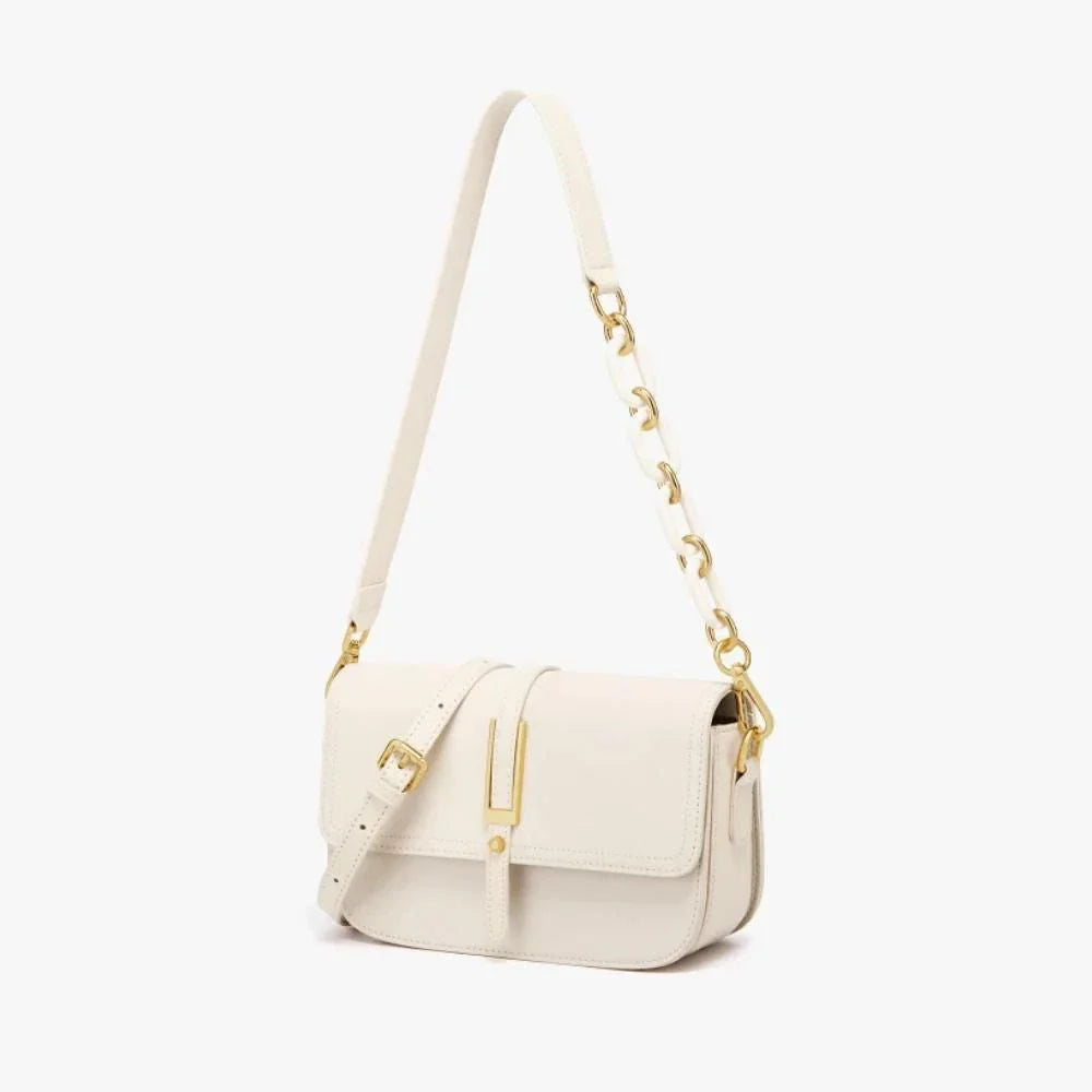 Elegant white leather crossbody bag for women with adjustable strap and multiple interior pockets for organized storage.