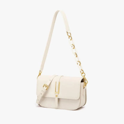 Elegant white leather crossbody bag for women with adjustable strap and multiple interior pockets for organized storage.