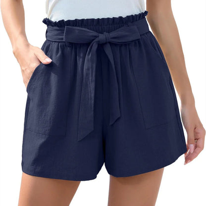 Ruffle bow waist tie shorts in black, made of lightweight and breathable polyester fabric, with convenient pockets for storage