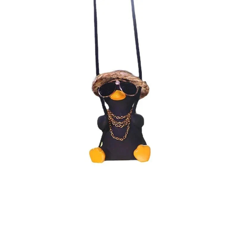 Cute swinging duck car pendant with a guitar and coke-themed design, adding a touch of personality to your vehicle