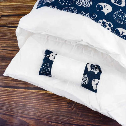 Cozy cat cave bed with a printed design, providing a plush and secure retreat for your feline friend.