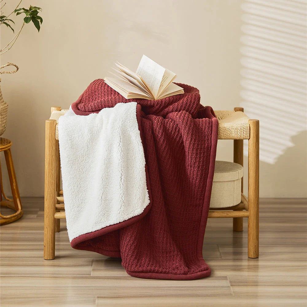 Cozy and stylish cotton plaid throw blanket in classic colors, perfect for adding warmth and charm to any living space