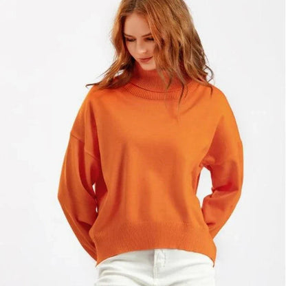 Chic and cozy oversized turtleneck sweater for women in a solid color, perfect for cold weather fashion and style