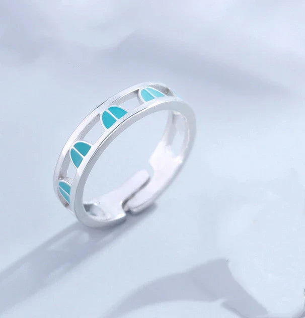 Adjustable couple rings in sterling silver with a celestial design of stars, moons, and clouds