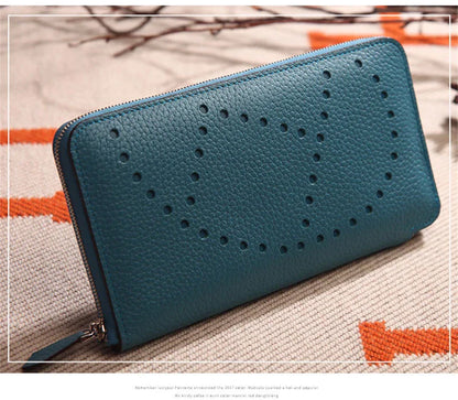 Premium cowhide leather clutch bag with lychee pattern design, featuring a medium-sized square shape and versatile style