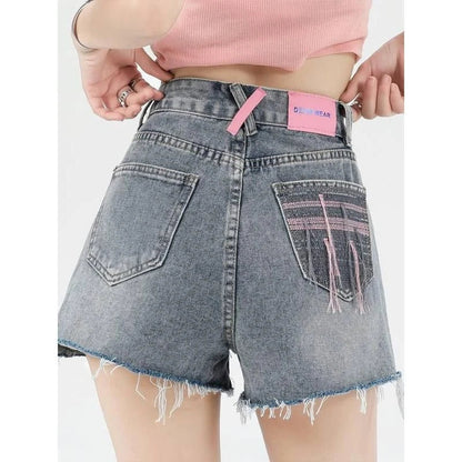 Premium high-waist denim shorts with charming embroidered details, perfect for summer fashion