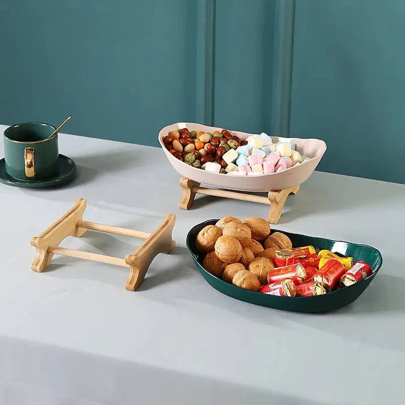 Three-tier plastic and bamboo fruit display tray with unique leaf-shaped design, available in white, beige, and green colors
